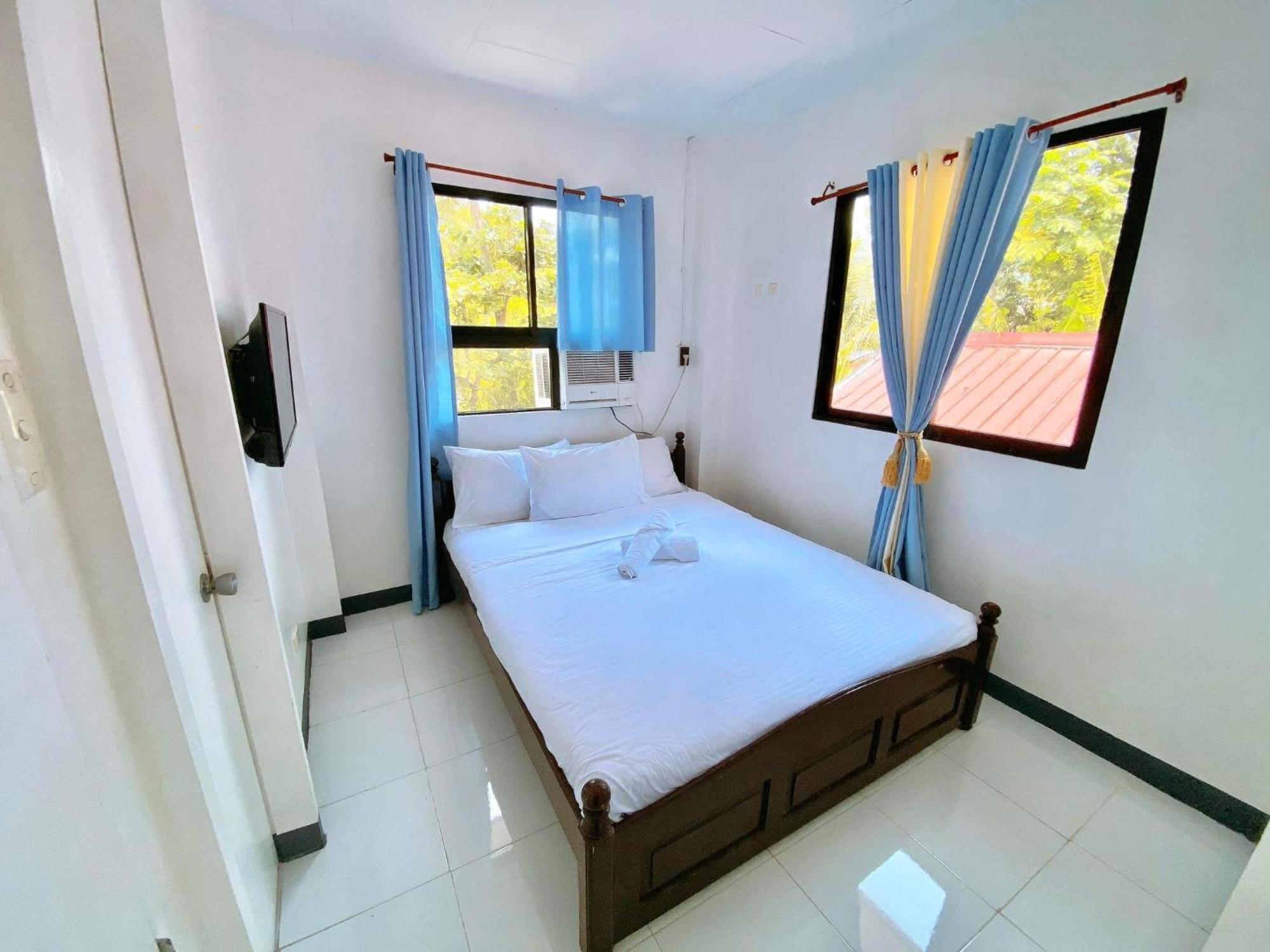 Luna Oslob Travellers Inn Extérieur photo